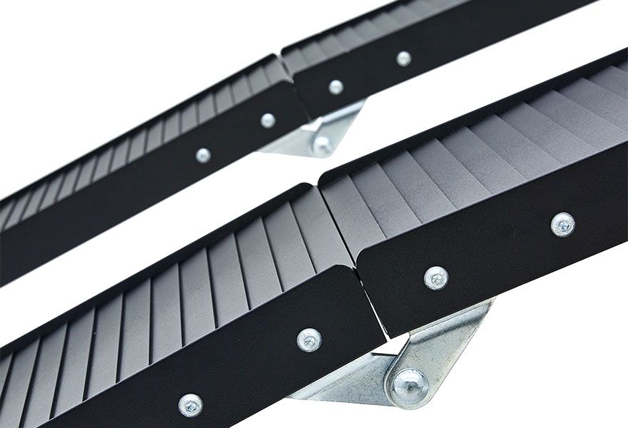 Extruded aluminum traction catches tires in motion